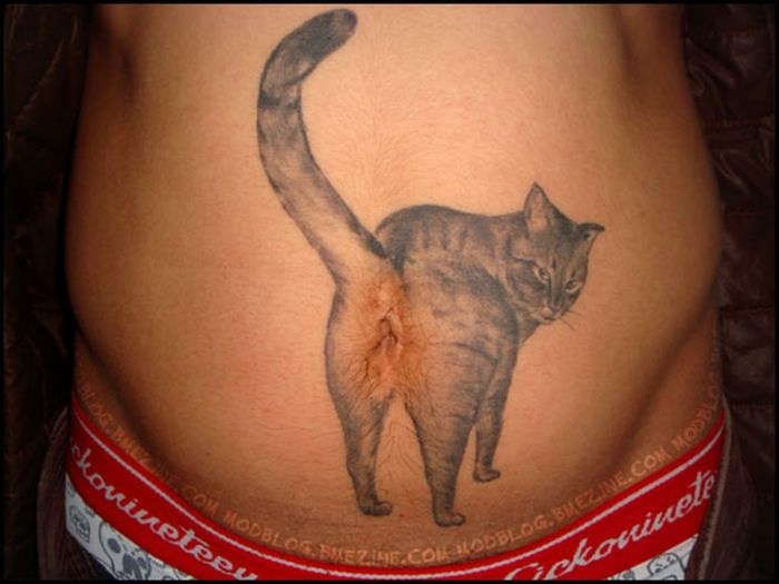 Tattoo heart on the lower back