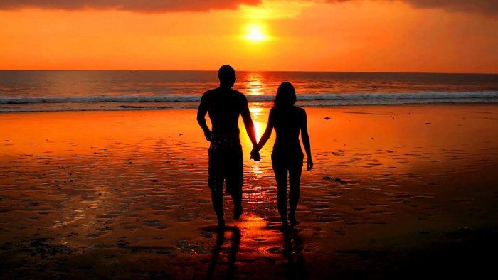 Two at sunset by the sea