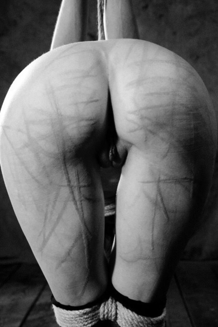 Cruel spanking of the girl BDSM