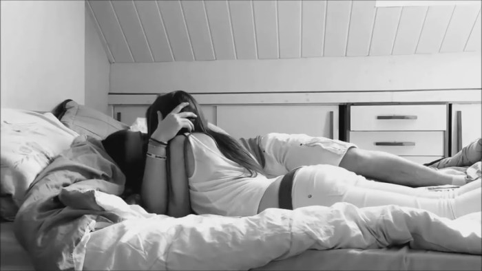 Guy and girl in bed