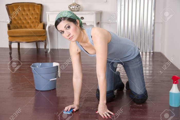 Girl washing floor