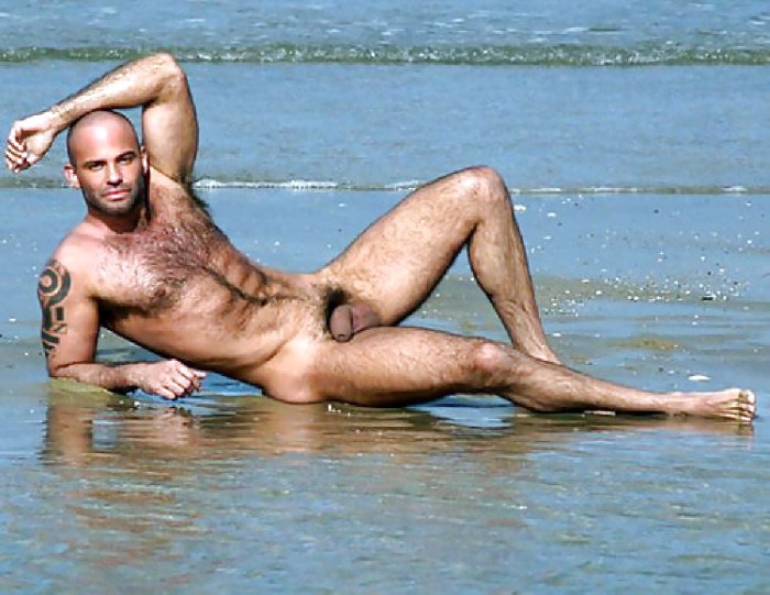 Naked young guys on the beach