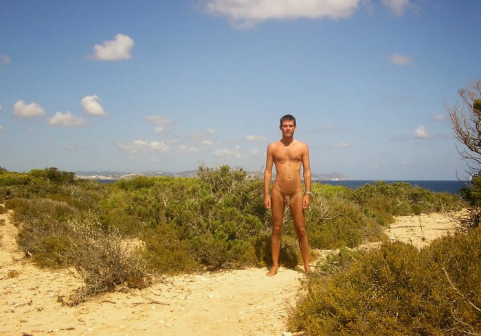 Naked men and women on the beach