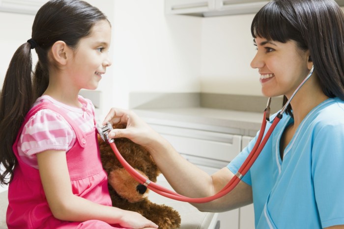 Male doctor Examines Kids