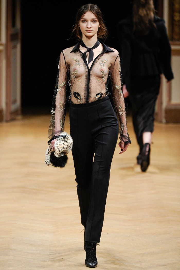 Model breast on the catwalk