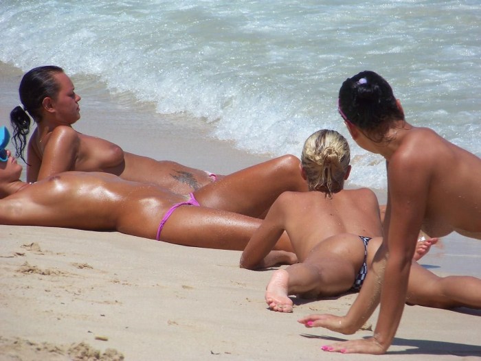 Girls on the beach without swimwear