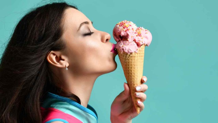 Beautiful girls eat ice cream