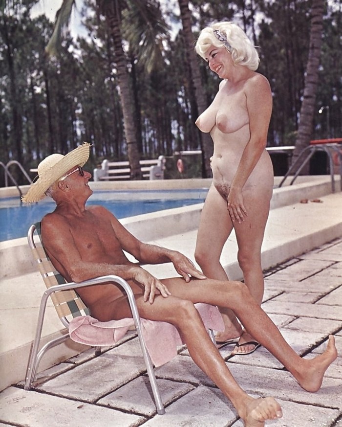Father and Young Daughter on the Nude Beach
