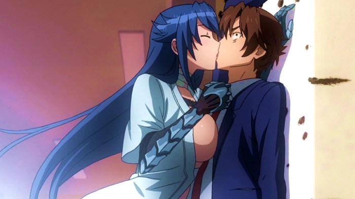 The guy kisses the girl on the street