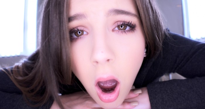Licks a finger