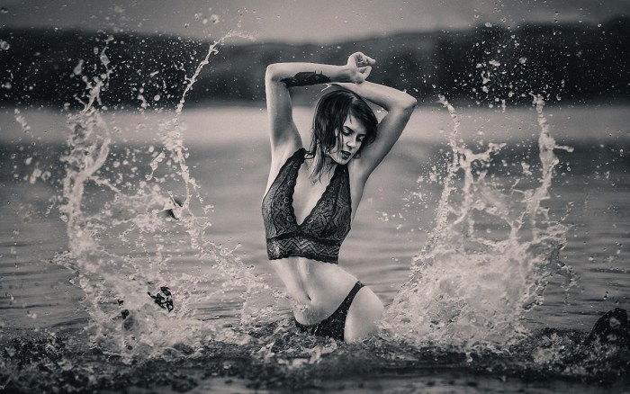 Girl in the water black white photo