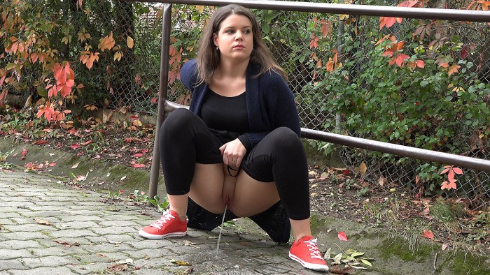 In leggings girls pissing on the street