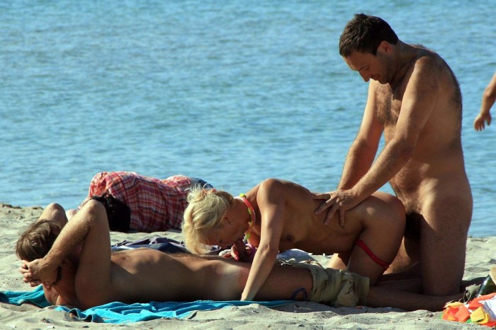 Burnts of vacationers on the beach