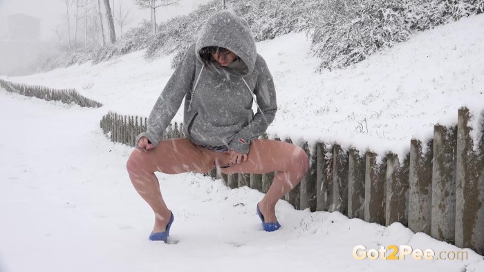 Naked women in the winter in the country