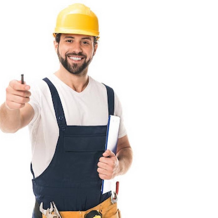 A man in a helmet shows a class