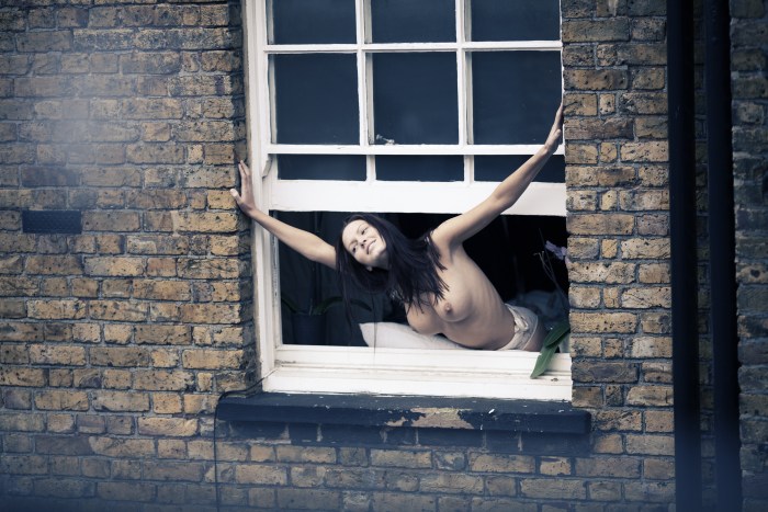 Naked woman on the balcony Private