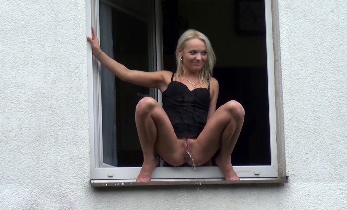 The wife shows her naked body out the window