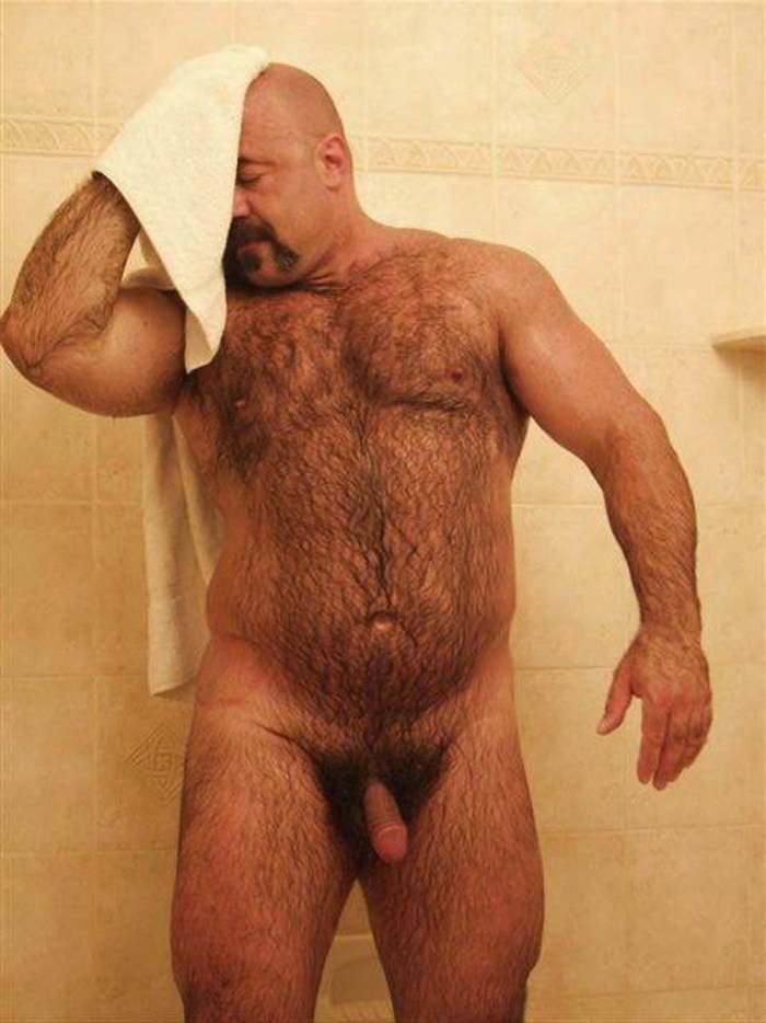 Naked guys wash in the shower
