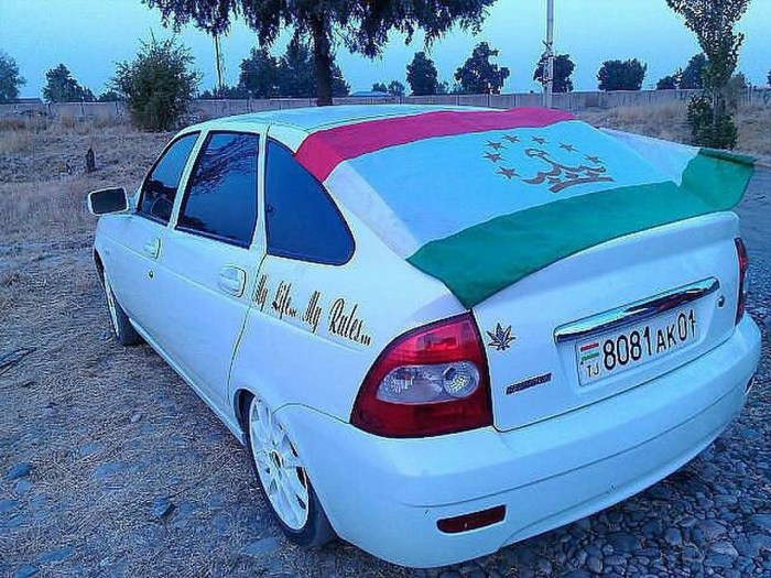 Car with the flag of Tajikistan