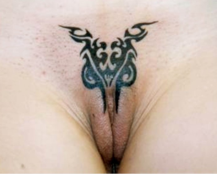 Black -term vagina with a tattoo
