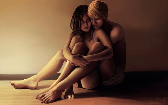 Two girls hug