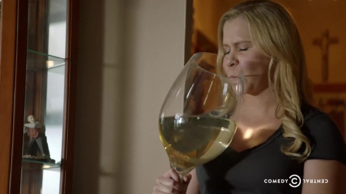 Woman and big glass