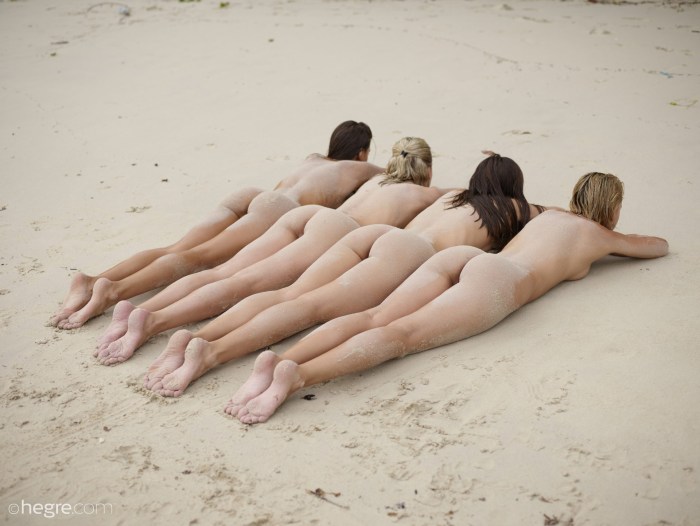 Naked butt in a row on the beach