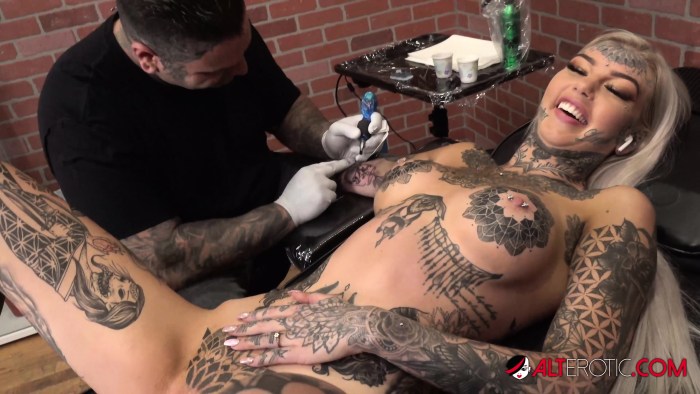 Huge tattooed boobs