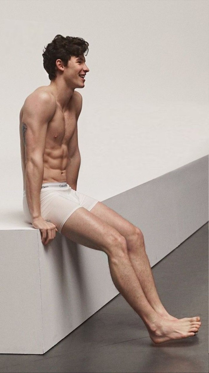 Naked man with a coffee mug