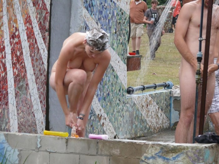 Nudist in the shower on the street
