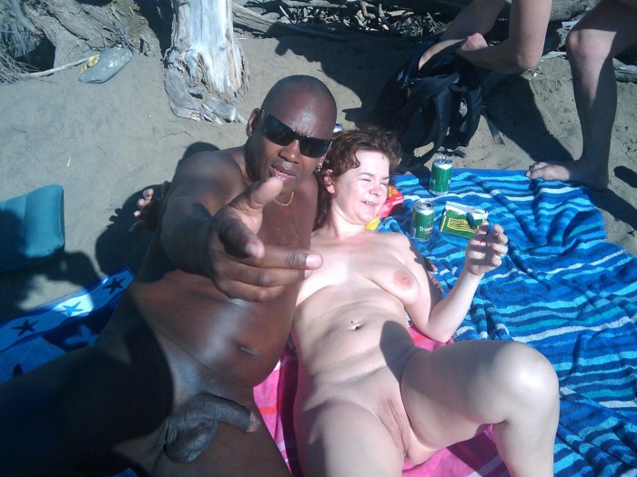 Wife with a black man on the beach private
