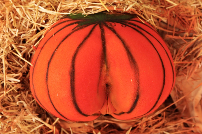 Naked asses with pumpkin