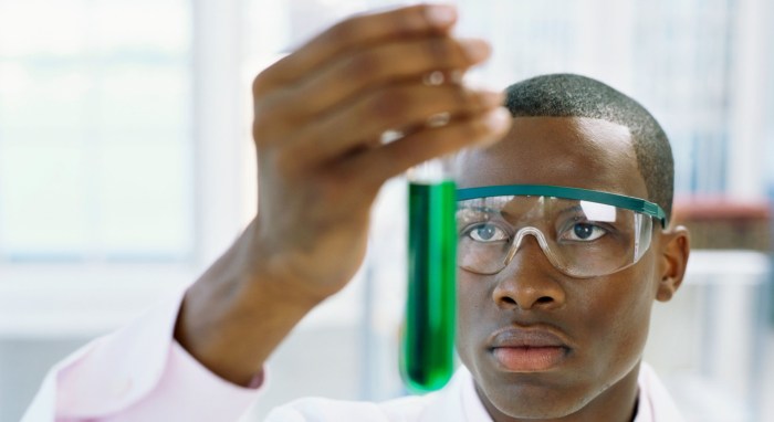 Negro scientist with a test tube