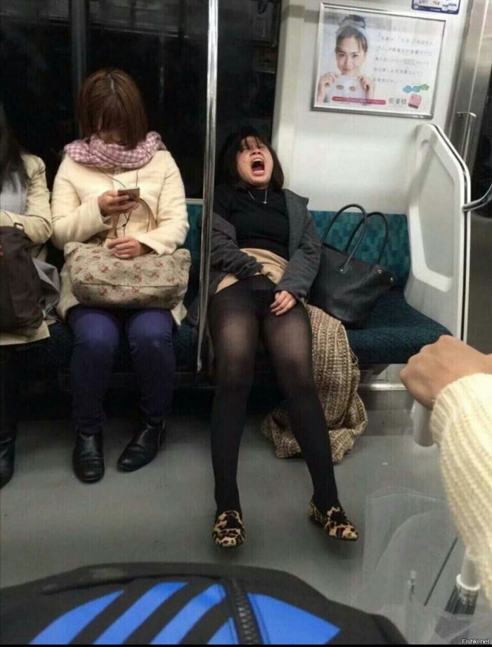Tights under the skirt in the subway