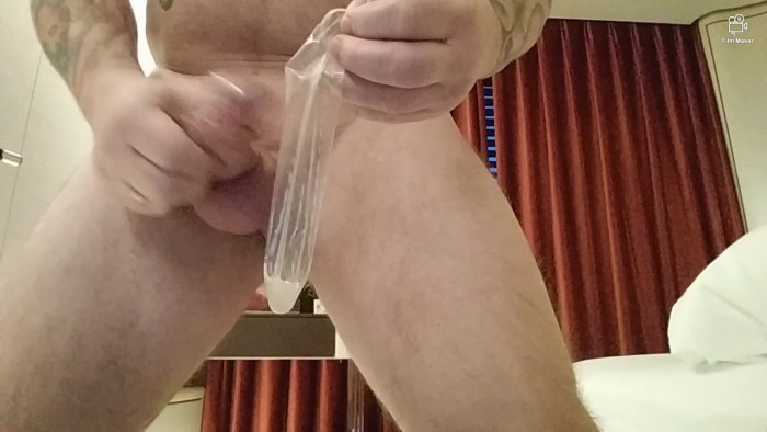 Lady in PVC Giving A Bizarre Handjob with Condom