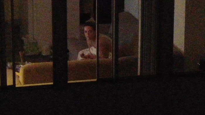 Peeping at the bedroom window