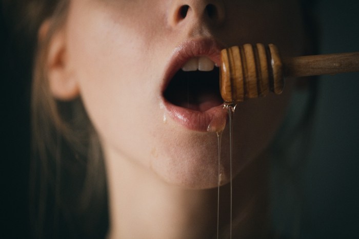 The girl licks herself