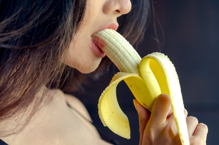 Female lips and banana