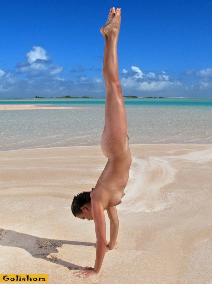 Erotic gymnastics on the beach