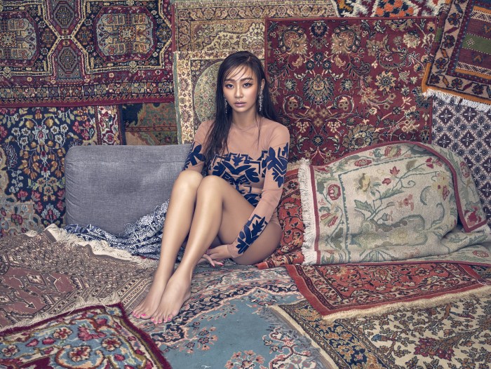 Photo shoot on the background of carpets