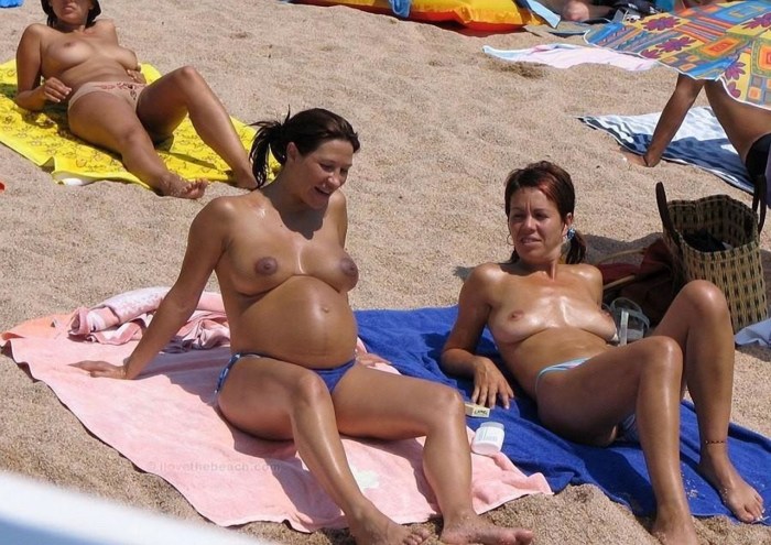 Naked pregnant women on the beach