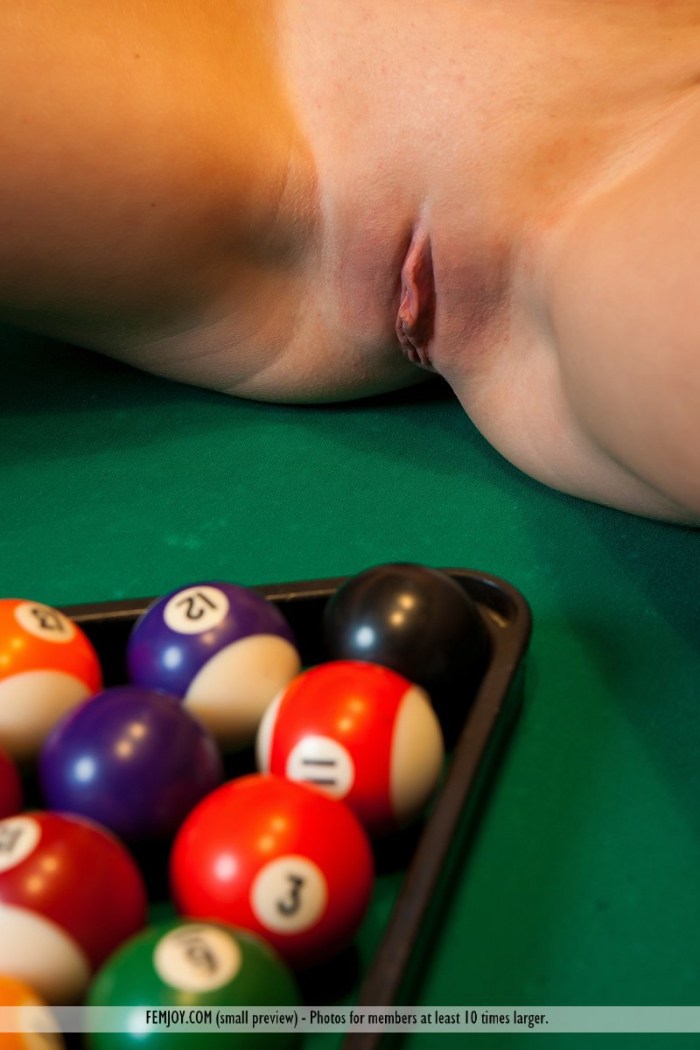 Naked on a billiard table