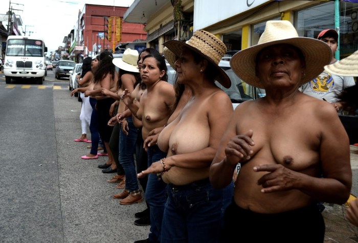 Naked women show their vaginas