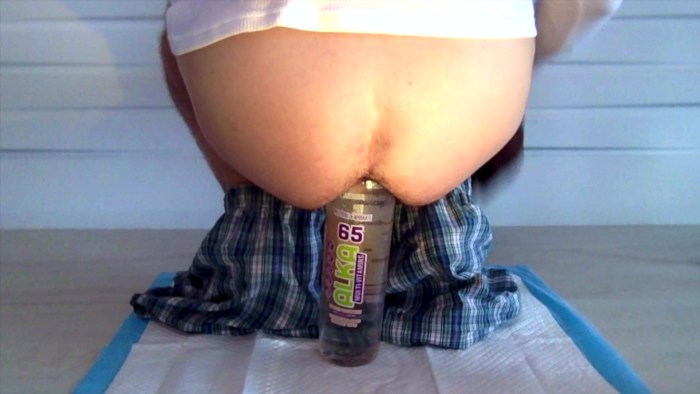 Male fisting with a bottle