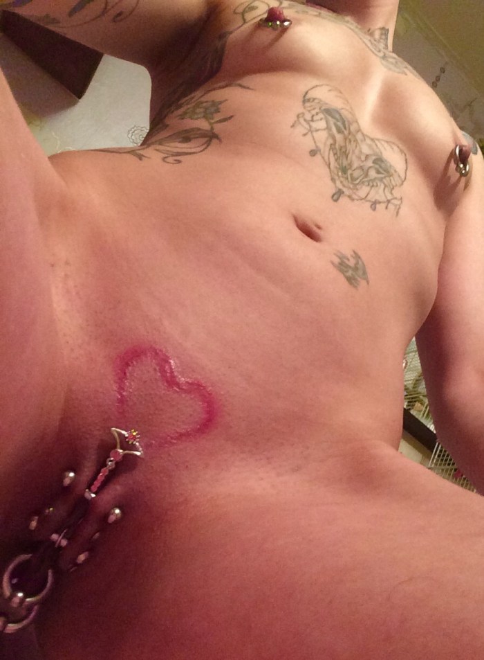 BDSM piercing vagina tattoo