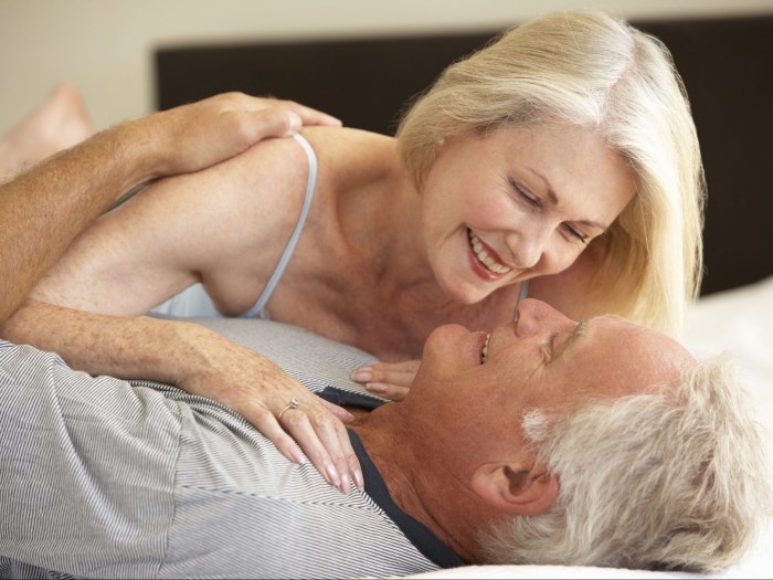 Elderly couple in bed