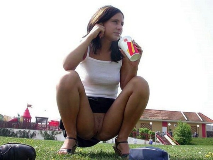 Women in shorts squatting