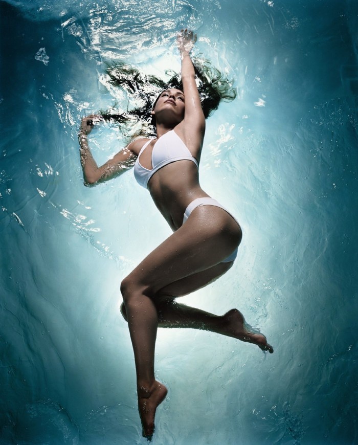 Girl in a swimsuit under water