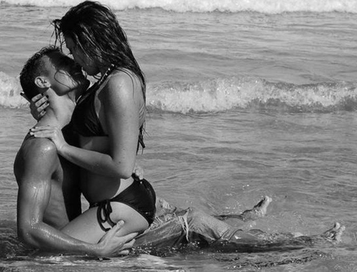 Man and girl on the beach