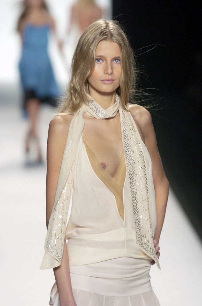Fashion show with bare breasts